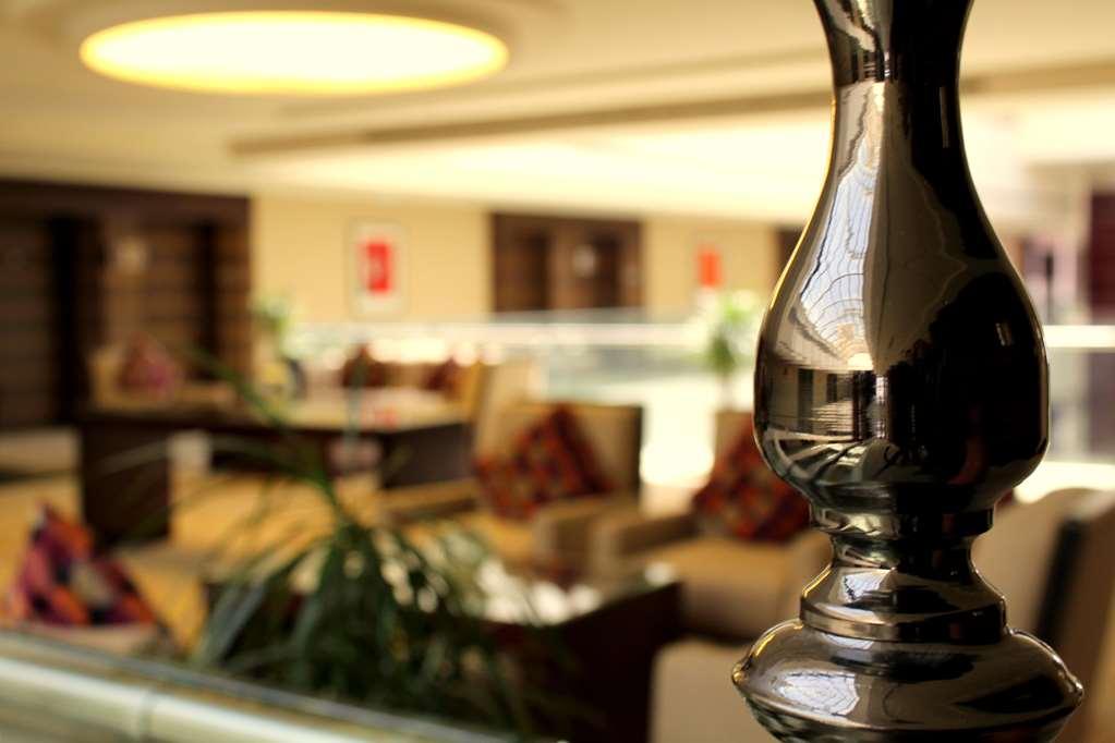 Safir Fintas Hotel Kuwait Kuwait City Restaurant photo The lobby of the hotel