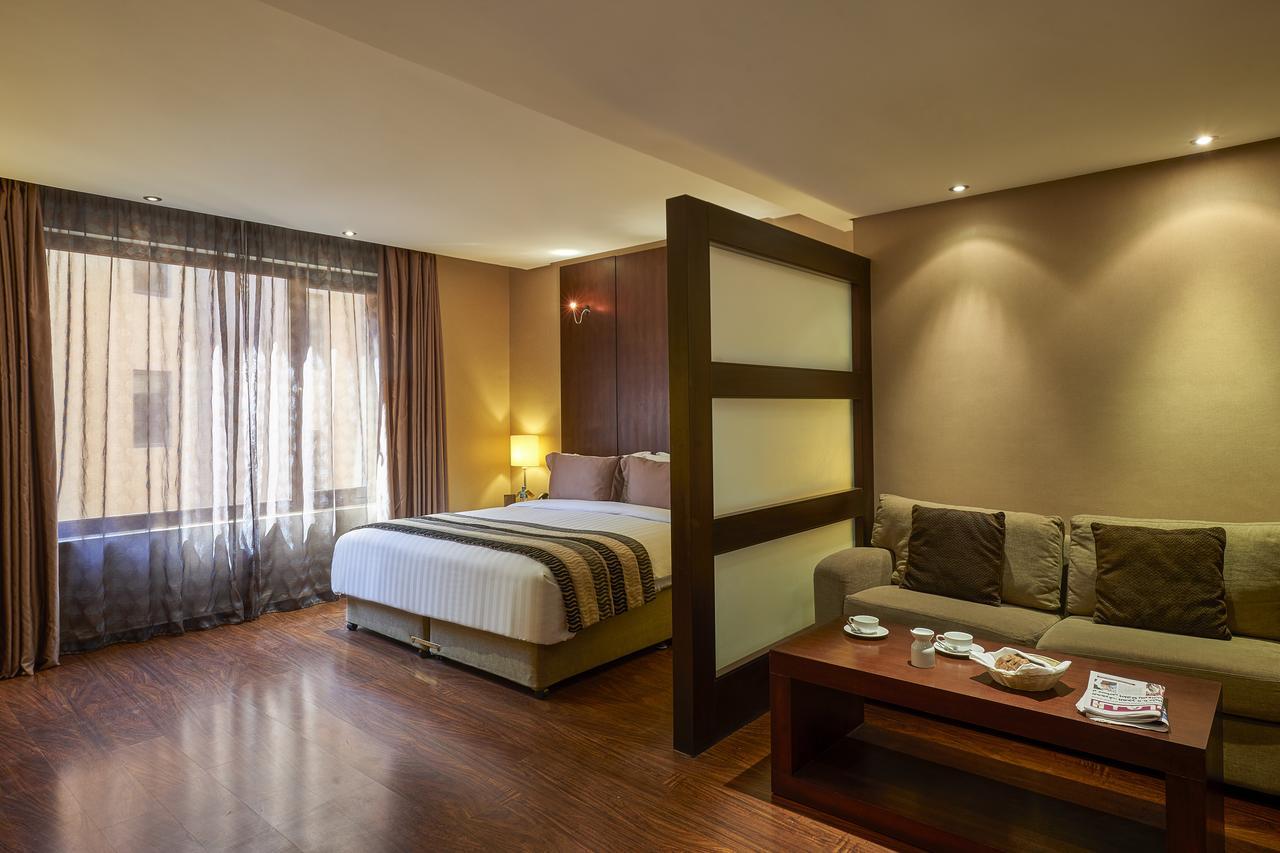 Safir Fintas Hotel Kuwait Kuwait City Exterior photo A room at the hotel